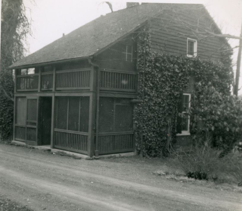 black and white photo of the two-story Bacelor's Cottage in 1951